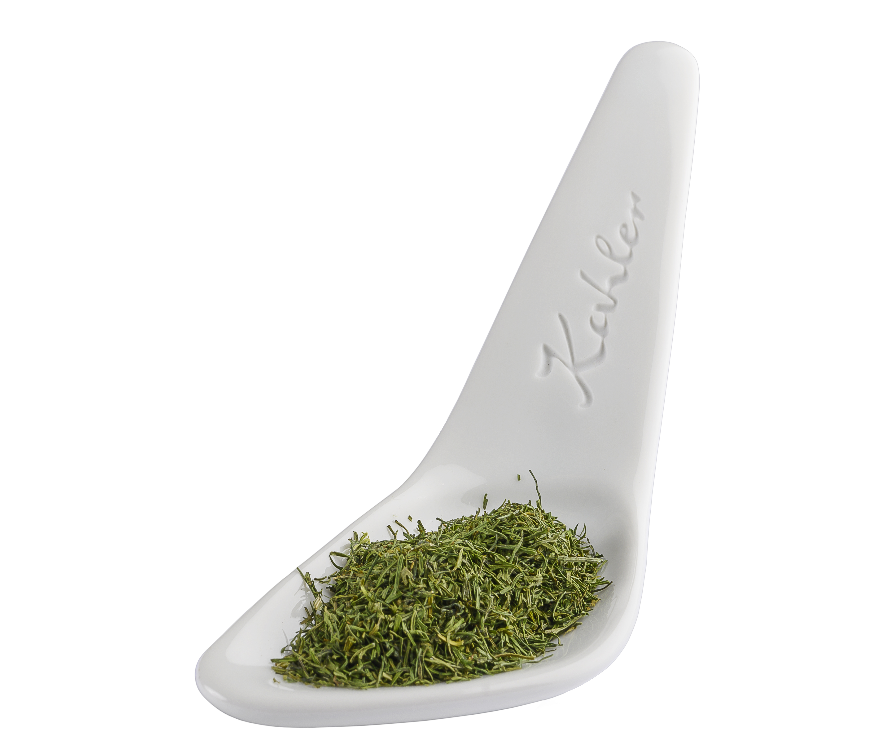 Weiße Keramikschale in Löffelform mit grünen, gerebelten Dillspitzen. Kahler