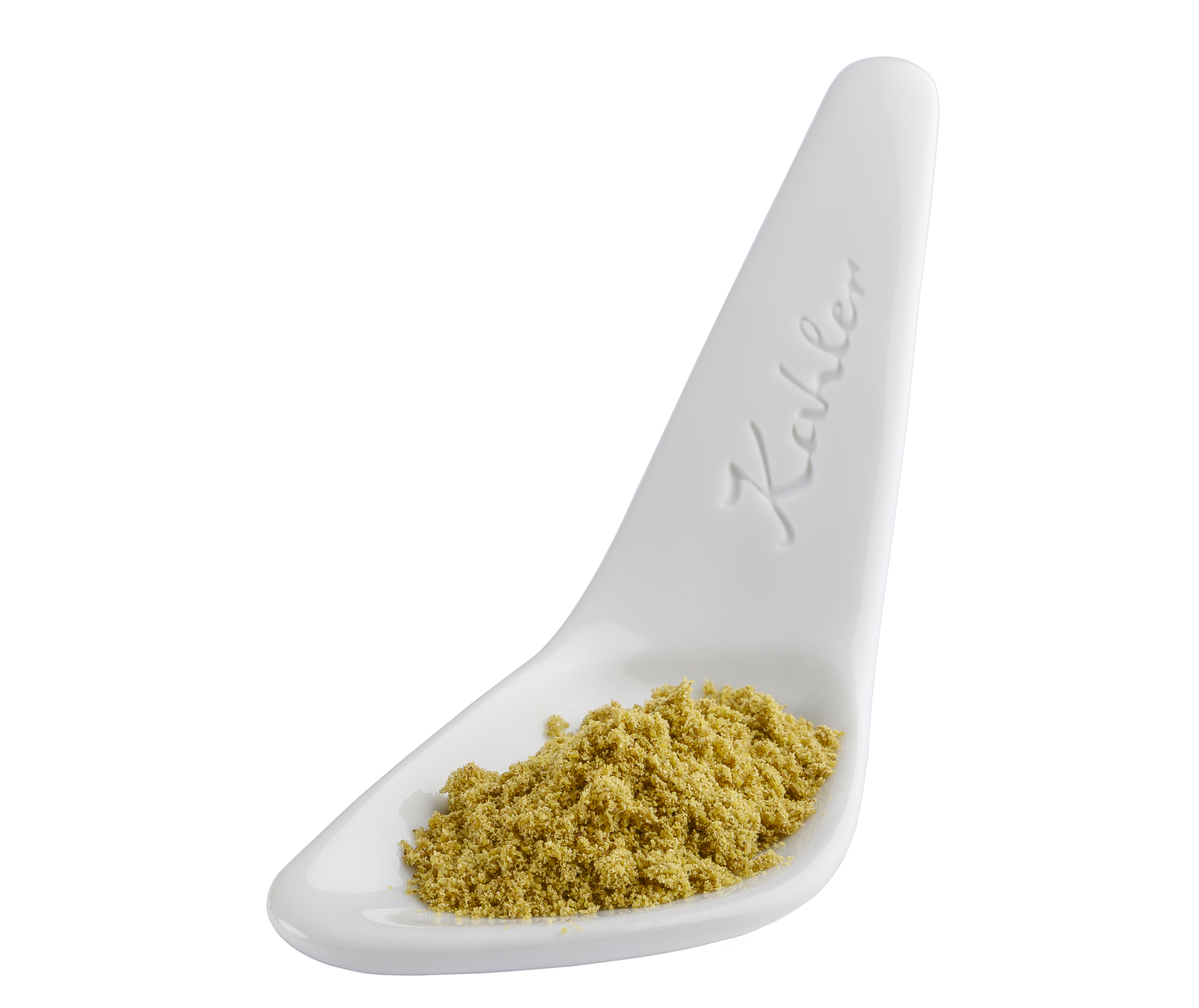 Weißer Keramikloeffel mit "Kahler"-Praegung, darauf Anispulver