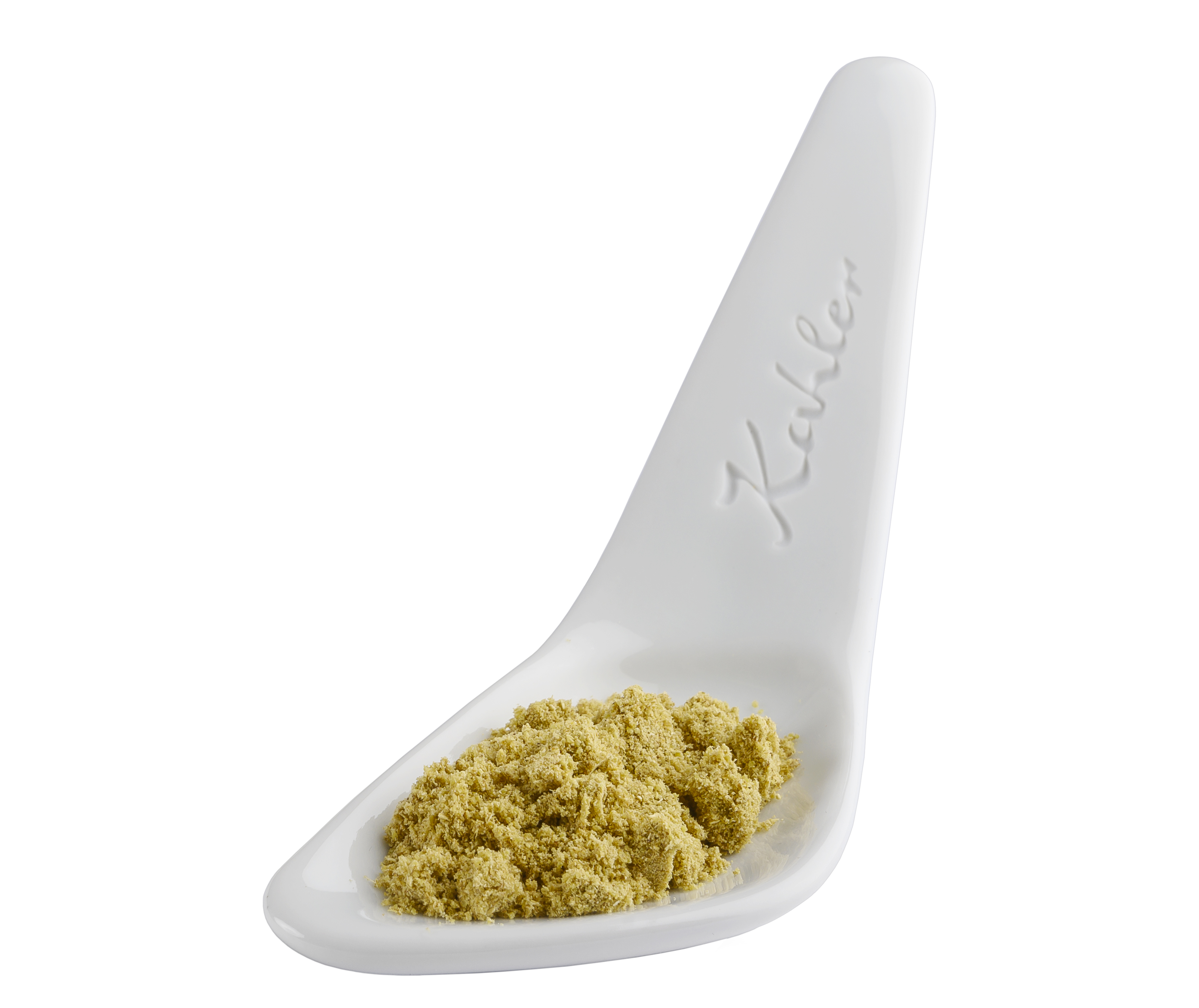 Weißer Kahler Keramiklöffel mit einer Portion gemahlenem Fenchel