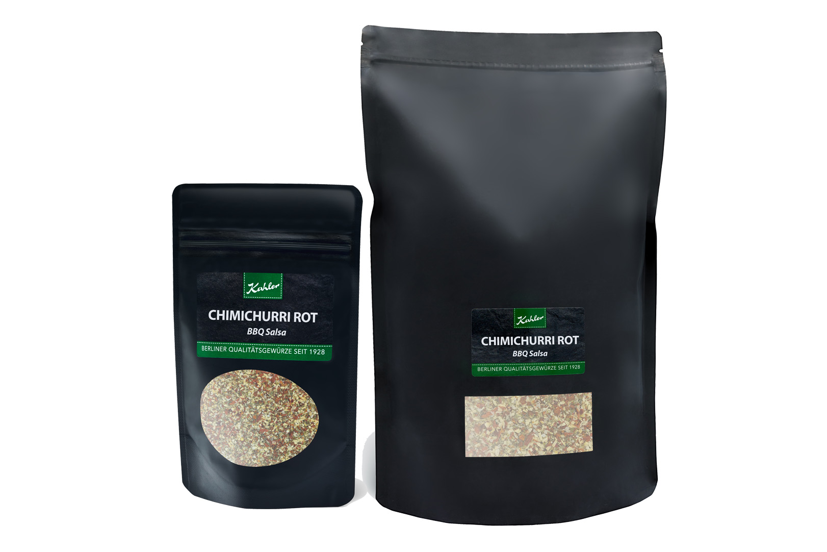 Zwei schwarze Verpackungen mit Sichtfenstern, beschriftet mit 'Kahler CHIMICHURRI ROT BBQ Salsa BERLINER QUALITÄTSGEWÜRZE SEIT 1928'